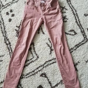 Rose colored skinny jeans